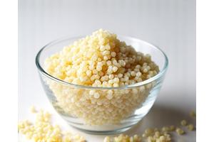 A small bowl of cooked quinoa, a complete plant-based protein grain